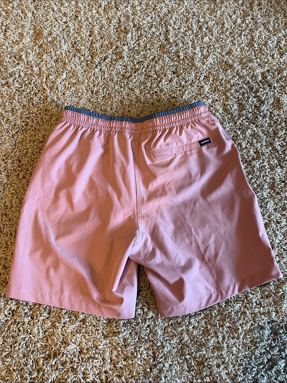 Chubbies men’s adult small swim trunks. Pink base with blue streak at the top. - Picture 2 of 5